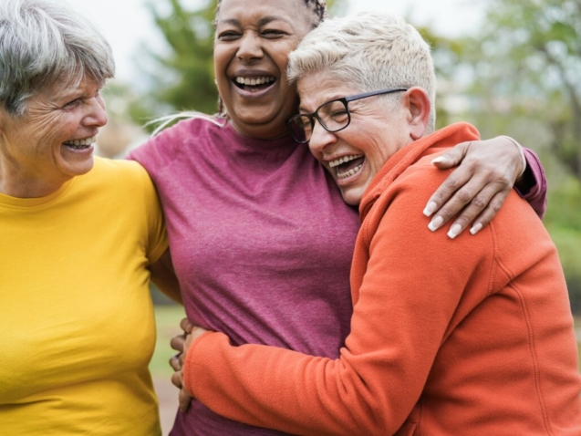 Multiracial senior women having fun together after sport workout outdoor - Main focus on right female face